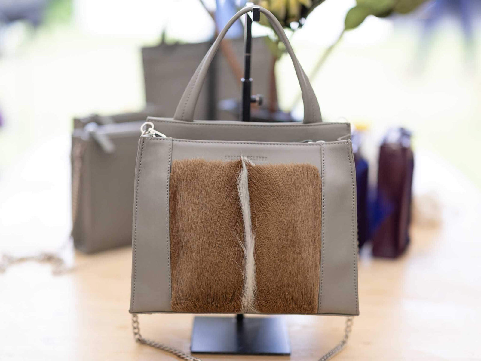 Top Handle Springbok Handbag in Slate Grey with a fan feature by Sherene Melinda front