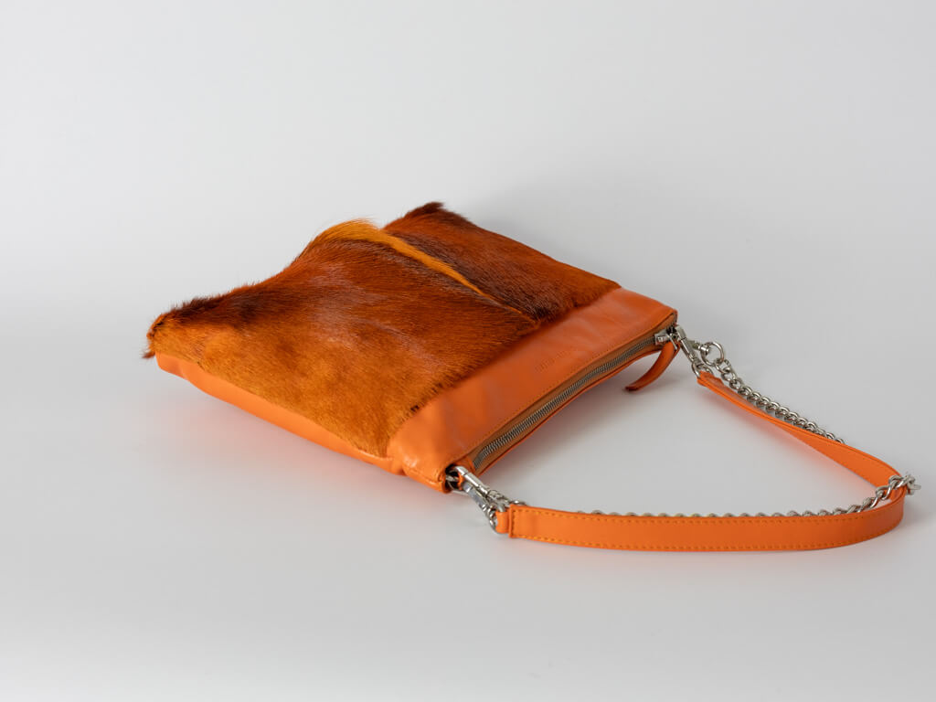 Multiway Springbok Handbag in Orange with a Fan
