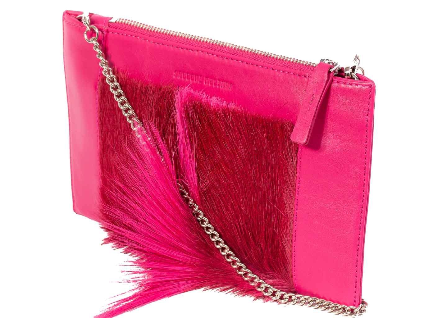 Clutch Springbok Handbag in Fuchsia with a fan feature by Sherene Melinda front angle strap