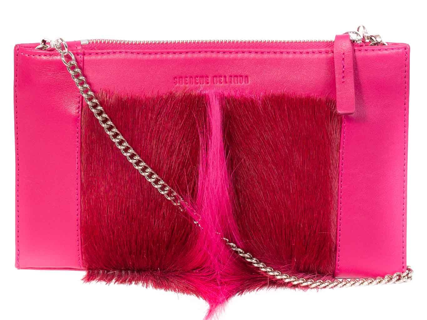Clutch Springbok Handbag in Fuchsia with a fan feature by Sherene Melinda front strap
