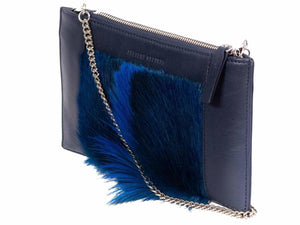 Clutch Springbok Handbag in Navy Blue with a fan feature by Sherene Melinda side angle strap