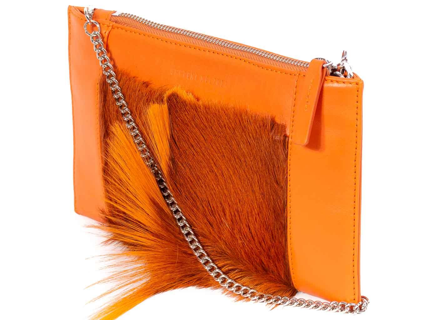 Clutch Springbok Handbag in Orange with a fan feature by Sherene Melinda side angle strap