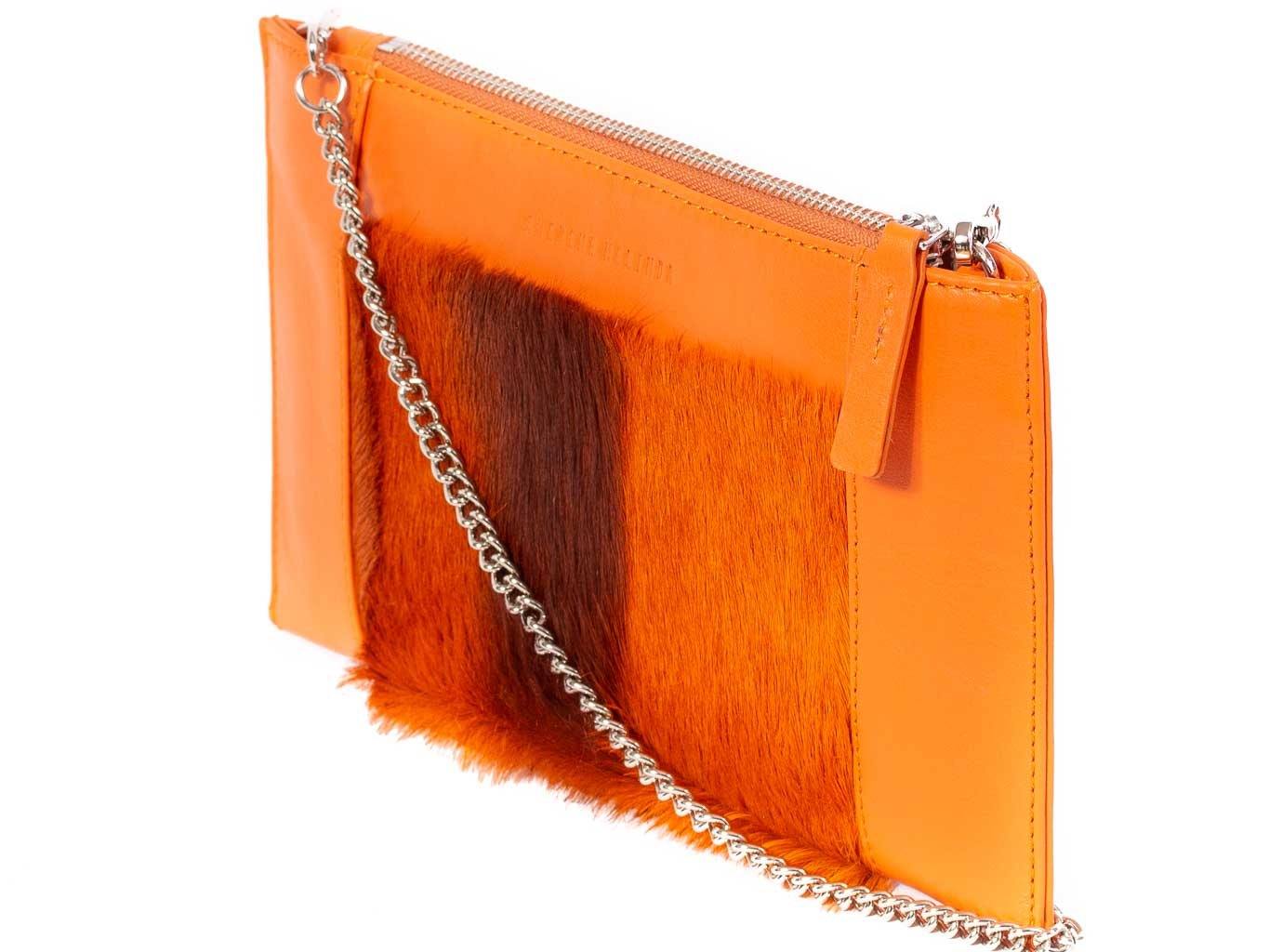Clutch Springbok Handbag in Orange with a stripe feature by Sherene Melinda front strap