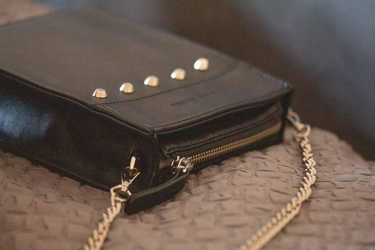 Messenger Studded Handbag in Black by Sherene Melinda side angle