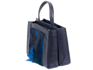 Top Handle Springbok Handbag in Navy Blue with a fan feature by Sherene Melinda side angle