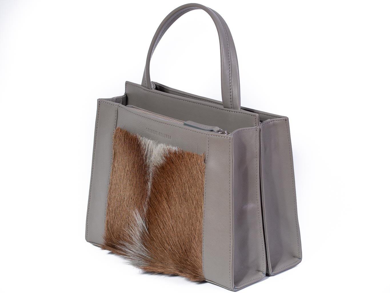 Top Handle Springbok Handbag in Slate Grey with a fan feature by Sherene Melinda side angle