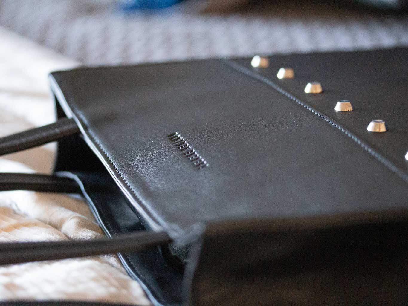 Tote Studded Handbag in Black by Sherene Melinda front handle