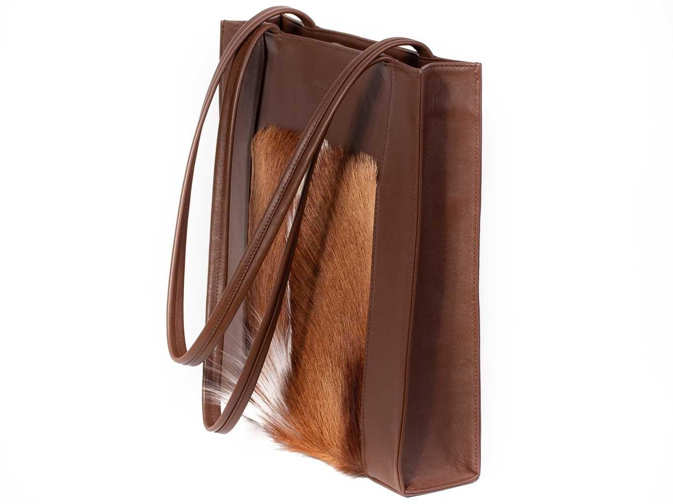 Tote Springbok Handbag in Cocoa Brown with a fan feature by Sherene Melinda side angle