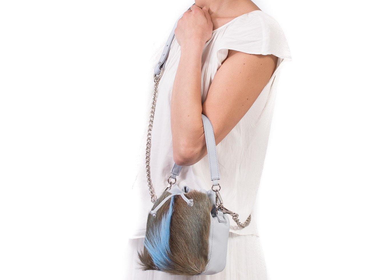 sherene melinda springbok hair-on-hide baby blue leather pouch bag fan front strap