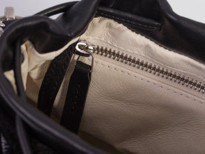 sherene melinda springbok hair-on-hide black leather pouch bag inside