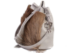 sherene melinda springbok hair-on-hide earth leather pouch bag Fan side angle