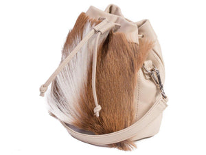 sherene melinda springbok hair-on-hide natural leather pouch bag Fan side angle