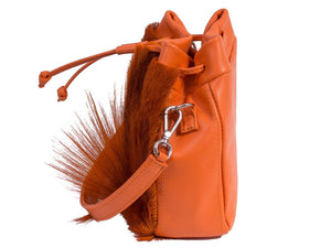sherene melinda springbok hair-on-hide orange leather pouch bag Fan side