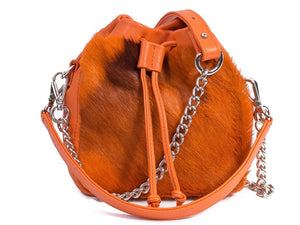 sherene melinda springbok hair-on-hide orange leather pouch bag stripe front strap