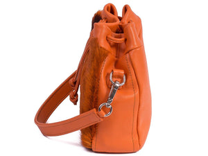 sherene melinda springbok hair-on-hide orange leather pouch bag Stripe side