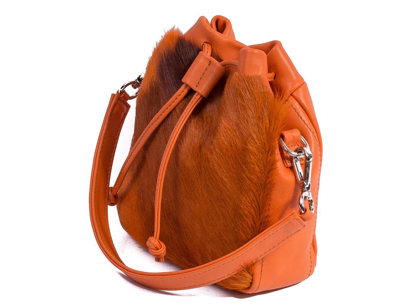sherene melinda springbok hair-on-hide orange leather pouch bag Stripe side angle