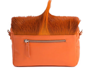 sherene melinda springbok hair-on-hide orange leather shoulder bag Fan back