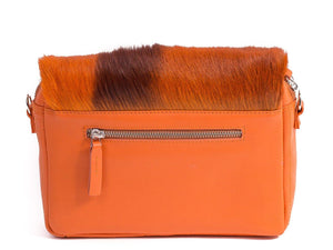 sherene melinda springbok hair-on-hide orange leather shoulder bag Stripe back