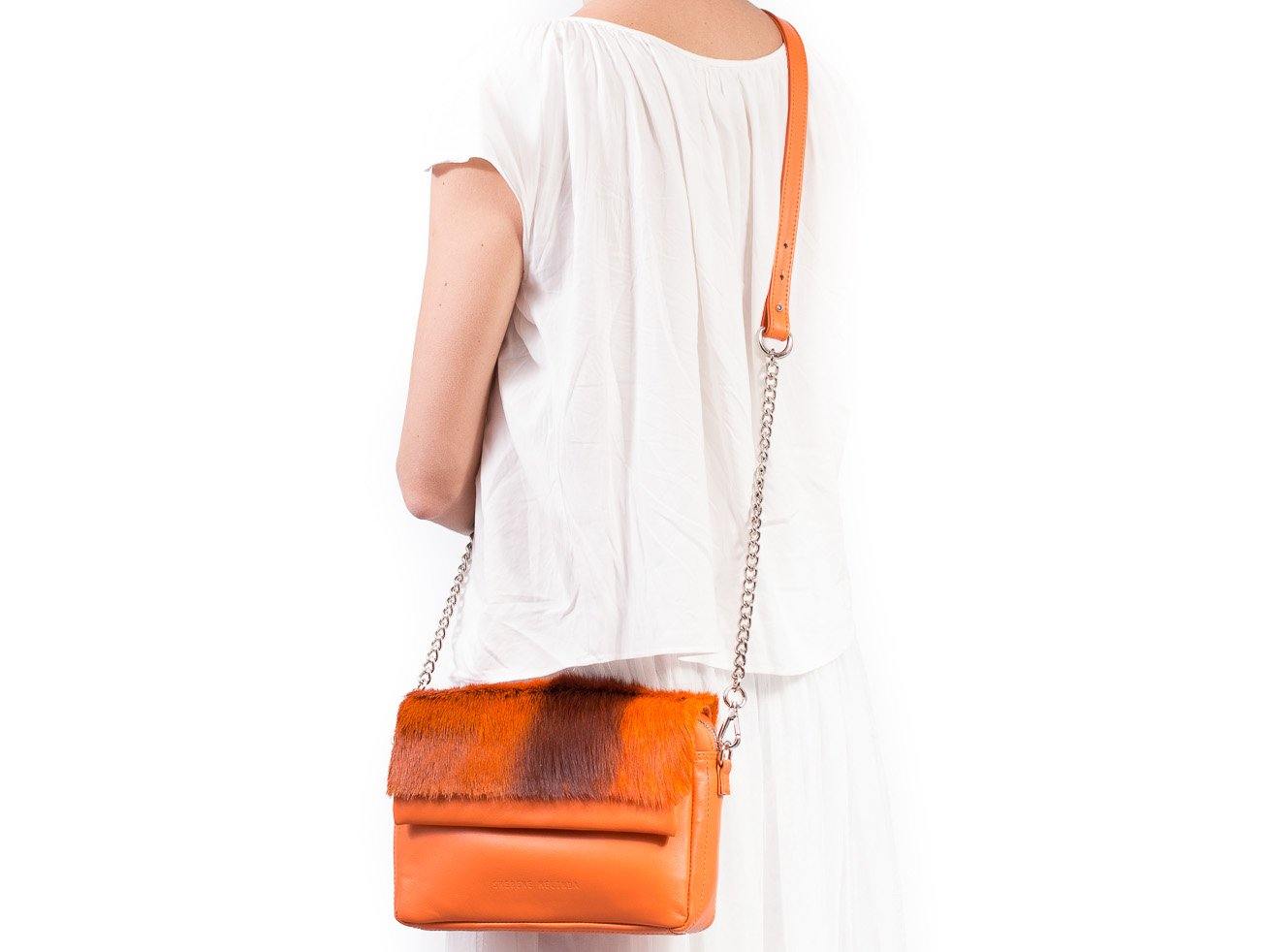 sherene melinda springbok hair-on-hide orange leather shoulder bag stripe front strap