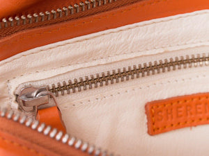 sherene melinda springbok hair-on-hide orange leather Sophy SS18 Clutch Bag inside