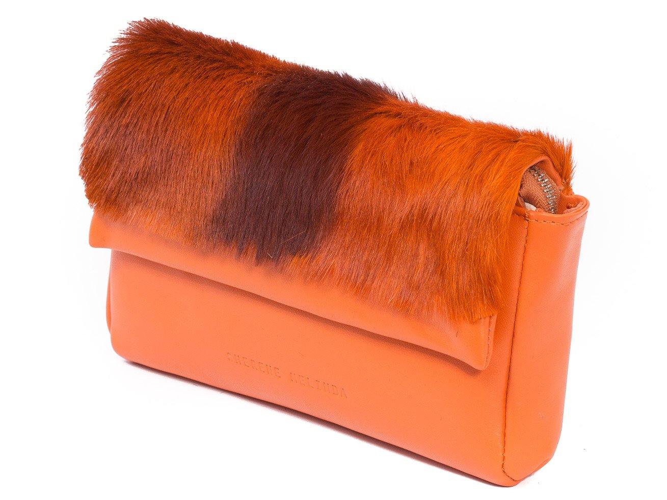 sherene melinda springbok hair-on-hide orange leather Sophy SS18 Clutch Bag Stripe side angle