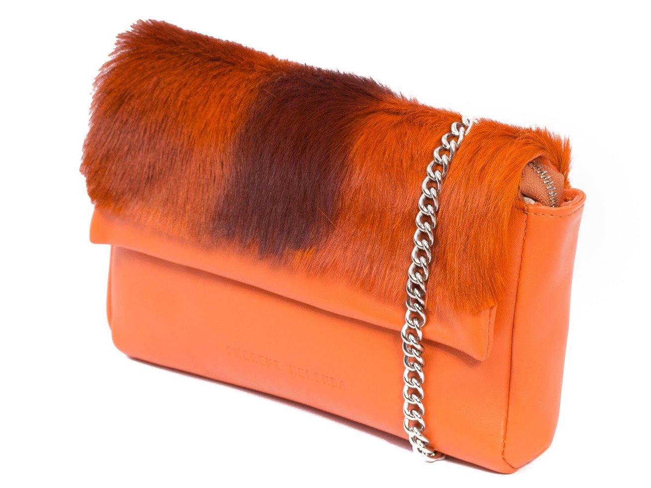 sherene melinda springbok hair-on-hide orange leather Sophy SS18 Clutch Bag Stripe side angle strap