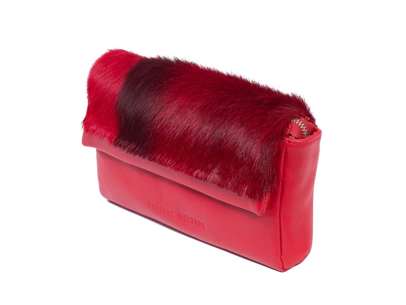 sherene melinda springbok hair-on-hide red leather Sophy SS18 Clutch Bag Stripe side angle