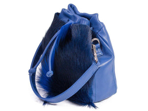 sherene melinda springbok hair-on-hide royal blue leather pouch bag Fan side angle