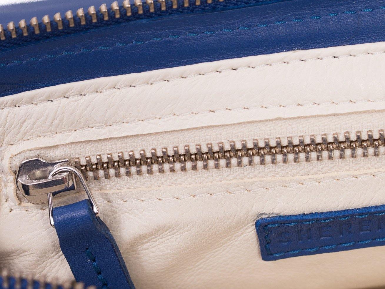 sherene melinda springbok hair-on-hide royal blue leather Sophy SS18 Clutch Bag inside